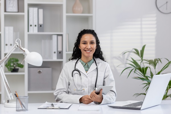 Friendly female doctor smiling in a modern office